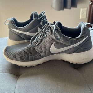 Gray Nike running shoes